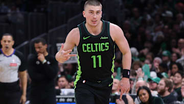 Apr 13, 2025; Boston, Massachusetts, USA; Boston Celtics guard Payton Pritchard (11) reacts after making a three-pointer during the second half against the Charlotte Hornets at TD Garden. Mandatory Credit: Paul Rutherford-Imagn Images