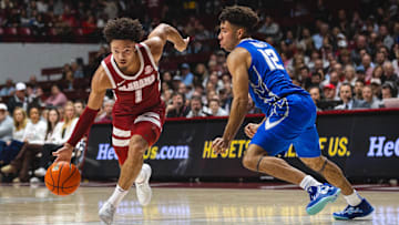 Dec 14, 2024; Tuscaloosa, Alabama, USA; Alabama Crimson Tide guard Mark Sears (1) drives the ball against Creighton Bluejays guard Shane Thomas (12) during the first half at Coleman Coliseum. Mandatory Credit: Will McLelland-Imagn Images
