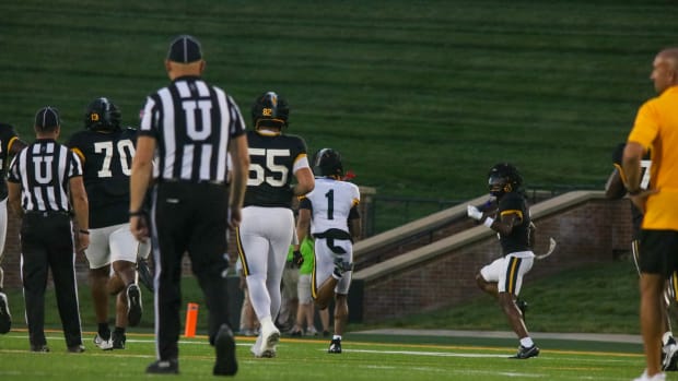 Missouri Tigers safety Marvin Burks Jr. rushes past the defense at the team's annual fan night practice at Faurot Field 