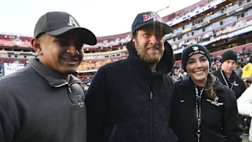 Dec 14, 2024; Landover, Maryland, USA;  Dave Portnoy poses with solders before the between the Army Black Knights and the Navy Midshipmen  at Commanders Field. Mandatory Credit: Tommy Gilligan-Imagn Images