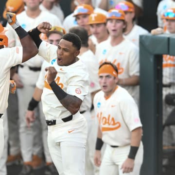 Tennessee's Christian Moore (1) and Kavares Tears (21) celebrate Tears' home run against Southern Miss in the NCAA Baseball Tournament's Knoxville Regional on Sunday, June 2, 2024 in Knoxville, Tenn.