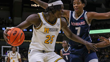 Nov. 8, 2024; Columbia, Missouri, USA; Missouri guard Mark Mitchell (25) makes a drive towards the basket against the Howard Bison..