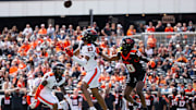 Oregon State's Exodus Ayers, left, and Taz Reddicks jump for the tipped ball during the Oregon State Spring Game at Reser Stadium on Saturday, April 19, 2025, in Corvallis, Ore.