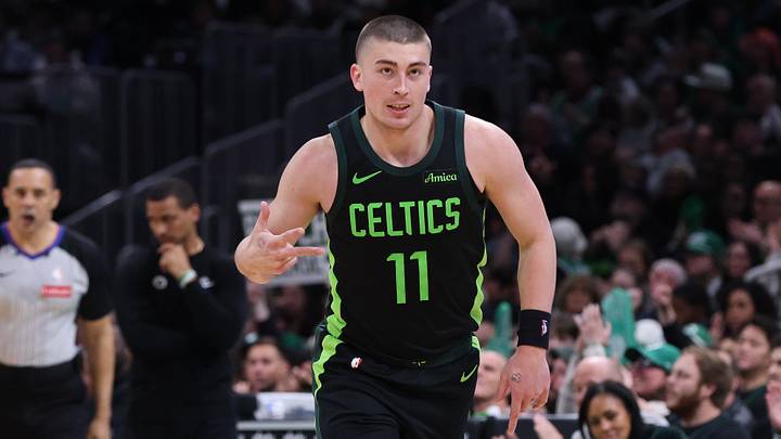 Apr 13, 2025; Boston, Massachusetts, USA; Boston Celtics guard Payton Pritchard (11) reacts after making a there pointer during the second half against the Charlotte Hornets at TD Garden. Mandatory Credit: Paul Rutherford-Imagn Images