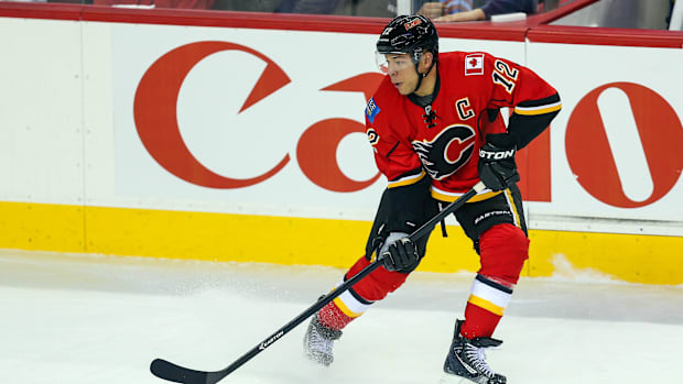 Calgary Flames right wing Jarome Iginla skates with the puck against St. Louis Blues.
