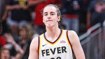 Jul 9, 2025; Indianapolis, Indiana, USA; Indiana Fever guard Caitlin Clark (22) in the first half against Golden State Valkyries at Gainbridge Fieldhouse. Mandatory Credit: Trevor Ruszkowski-Imagn Images