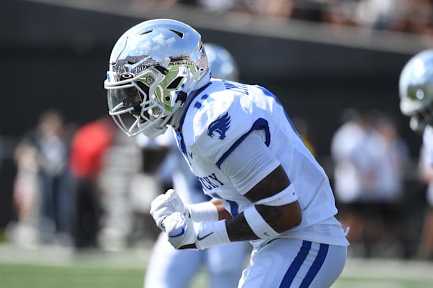 Kentucky Wildcats defensive back Zion Childress celebrates after a defensive stop against the Vanderbilt Commodores