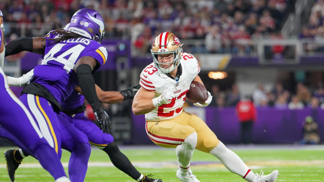 San Francisco 49ers running back Christian McCaffrey (23) runs with the ball against the Minnesota Vikings in the first quarter at U.S. Bank Stadium in Minneapolis on Oct. 23, 2023. 