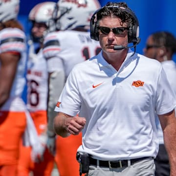 Oklahoma State head coach Mike Gundy walks off the field in the second half during an NCAA football game between Oklahoma State and Tulsa in Tulsa, Okla., on Saturday, Sept. 14, 2024.