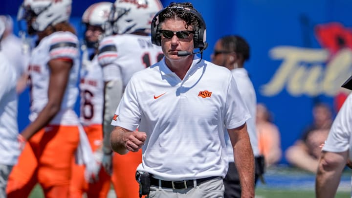 Oklahoma State head coach Mike Gundy walks off the field in the second half during an NCAA football game between Oklahoma State and Tulsa in Tulsa, Okla., on Saturday, Sept. 14, 2024.