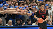Feb 15, 2025; Durham, North Carolina, USA;  Duke Blue Devils fans react while Stanford Cardinal guard Oziyah Sellers (4) looks for a pass during the first half at Cameron Indoor Stadium. Mandatory Credit: Zachary Taft-Imagn Images