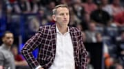 Mar 14, 2025; Nashville, TN, USA;  Alabama Crimson Tide head coach Nate Oats watches his team against the Kentucky Wildcats during the first half at Bridgestone Arena. Mandatory Credit: Steve Roberts-Imagn Images