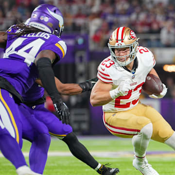 Oct 23, 2023; Minneapolis, Minnesota, USA; San Francisco 49ers running back Christian McCaffrey (23) runs with the ball against the Minnesota Vikings in the first quarter at U.S. Bank Stadium.