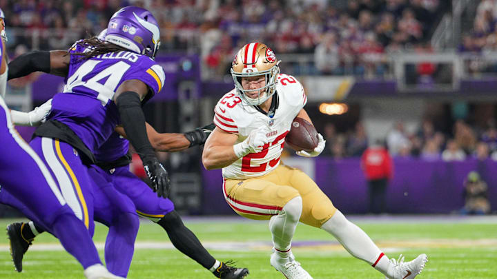 Oct 23, 2023; Minneapolis, Minnesota, USA; San Francisco 49ers running back Christian McCaffrey (23) runs with the ball against the Minnesota Vikings in the first quarter at U.S. Bank Stadium.