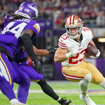 Oct 23, 2023; Minneapolis, Minnesota, USA; San Francisco 49ers running back Christian McCaffrey (23) runs with the ball against the Minnesota Vikings in the first quarter at U.S. Bank Stadium.