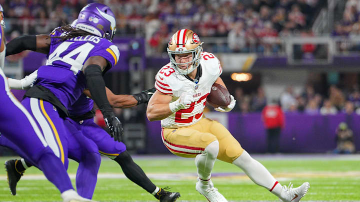 Oct 23, 2023; Minneapolis, Minnesota, USA; San Francisco 49ers running back Christian McCaffrey (23) runs with the ball against the Minnesota Vikings in the first quarter at U.S. Bank Stadium.