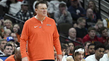 Mar 23, 2024; Omaha, NE, USA; Illinois Fighting Illini head coach Brad Underwood looks on during the second half against Duquesne Dukes in the second round of the 2024 NCAA Tournament at CHI Health Center Omaha. Mandatory Credit: Steven Branscombe-Imagn Images