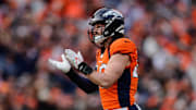 Dec 31, 2023; Denver, Colorado, USA; Denver Broncos linebacker Alex Singleton (49) reacts after a play in the second quarter against the Los Angeles Chargers at Empower Field at Mile High. Mandatory Credit: Isaiah J. Downing-Imagn Images