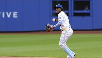Jun 15, 2025; New York City, New York, USA;  New York Mets shortstop Luisangel Acuna (2) throws out Tampa Bay Rays shortstop Taylor Walls (6) (not pictured) after fielding a ground ball during the fourth inning at Citi Field. Mandatory Credit: Gregory Fisher-Imagn Images