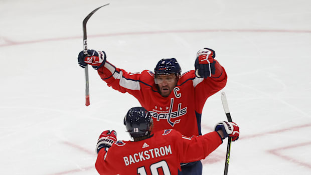 Backstrom celebrating with his triggerman Ovechkin after one of his many brilliant passes lead to a goal for No. 