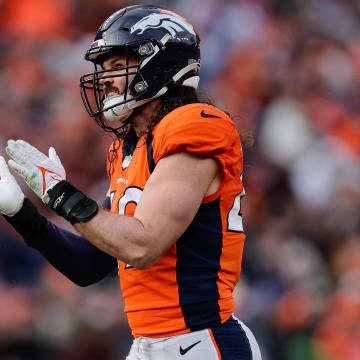 Dec 31, 2023; Denver, Colorado, USA; Denver Broncos linebacker Alex Singleton (49) reacts after a play in the second quarter against the Los Angeles Chargers at Empower Field at Mile High. Mandatory Credit: Isaiah J. Downing-USA TODAY Sports