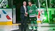 Oct 26, 2023; Dallas, Texas, USA; The Dallas Stars and general manager Jim Nill honor center Joe Pavelski (16) for scoring his 1,000 career NHL point in a ceremony before the game between the Dallas Stars and the Toronto Maple Leafs at the American Airlines Center. Mandatory Credit: Jerome Miron-Imagn Images