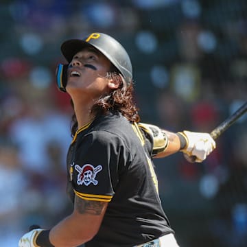 Mar 7, 2025; Bradenton, Florida, USA; Pittsburgh Pirates outfielder Ji Hwan Bae (3) singles against the Philadelphia Phillies in the fifth inning during spring training at LECOM Park. Mandatory Credit: Nathan Ray Seebeck-Imagn Images