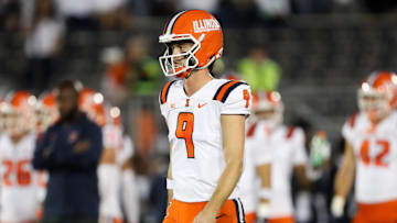 Sep 28, 2024; University Park, Pennsylvania, USA; Illinois Fighting Illini quarterback Luke Altmyer (9) walks on the field during a warmup prior to a game against the Penn State Nittany Lions at Beaver Stadium. Mandatory Credit: Matthew O'Haren-Imagn Images