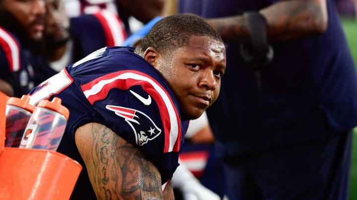 Sep 10, 2023; Foxborough, Massachusetts, USA; New England Patriots offensive tackle Trent Brown (77) sits on the bench during the second half against the Philadelphia Eagles at Gillette Stadium. Mandatory Credit: Eric Canha-USA TODAY Sports