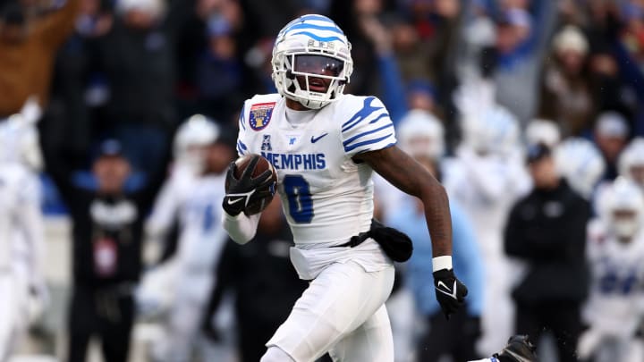 Dec 29, 2023; Memphis, TN, USA; Memphis Tigers wide receiver Demeer Blankumsee (0) runs after a catch for a touchdown during the first half against the Iowa State Cyclones at Simmons Bank Liberty Stadium. Mandatory Credit: Petre Thomas-USA TODAY Sports