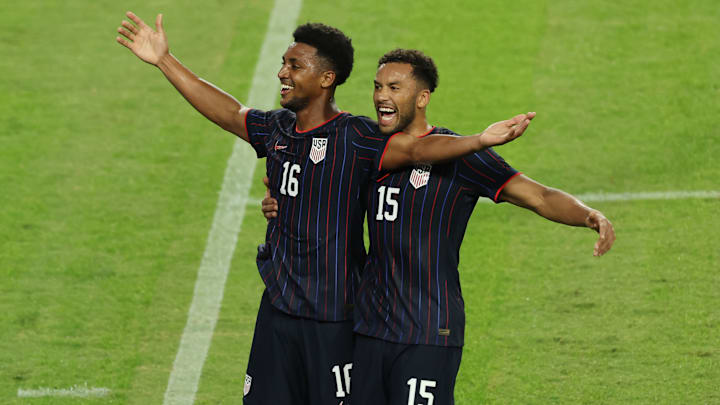 Alex Freeman celebrates one of his two goals in a recent USMNT win over Uruguay.