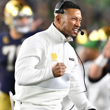 Oct 14, 2023; South Bend, Indiana, USA; Notre Dame Fighting Irish head coach Marcus Freeman celebrates after a Notre Dame interception against the USC Trojans at Notre Dame Stadium. 