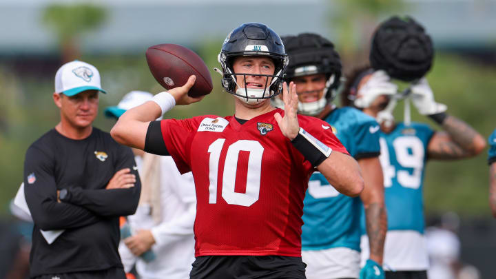 Jul 26, 2024; Jacksonville, FL, USA; Jacksonville Jaguars quarterback Mac Jones (10) participates in training camp at Miller Electric Center. Mandatory Credit: Nathan Ray Seebeck-USA TODAY Sports