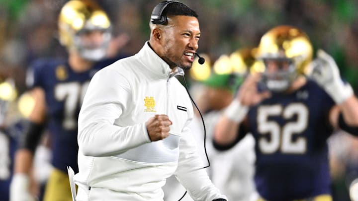 Oct 14, 2023; South Bend, Indiana, USA; Notre Dame Fighting Irish head coach Marcus Freeman celebrates after a Notre Dame interception against the USC Trojans at Notre Dame Stadium. 