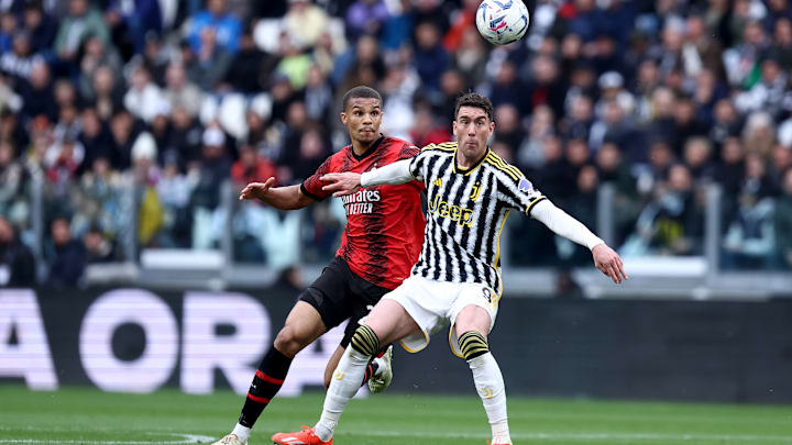 Malick Thiaw of Ac Milan (L) and Dusan Vlahovic of Juventus... Malick Thiaw of Ac Milan (L) and Dusan Vlahovic of Juventus...