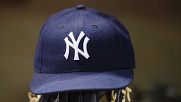 May 18, 2016; Phoenix, AZ, USA; Detailed view of a New York Yankees hat and baseball glove against the Arizona Diamondbacks at Chase Field. Mandatory Credit: Mark J. Rebilas-Imagn Images