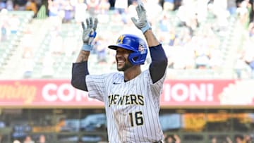 Milwaukee Brewers center fielder Blake Perkins (16) celebrates after driving home the winning run against the Miami Marlins at American Family Field.