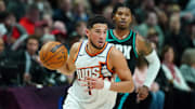 Nov 18, 2025; Portland, Oregon, USA; Phoenix Suns guard Devin Booker (1) dribbles the ball during the first half against the Portland Trail Blazers at Moda Center. Mandatory Credit: Soobum Im-Imagn Images
