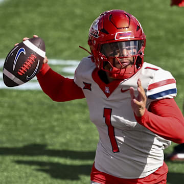 Oct 18, 2025; Houston, Texas, USA; Arizona Wildcats quarterback Noah Fifita (1) throws the ball during the first quarter against the Houston Cougars at TDECU Stadium. Mandatory Credit: Maria Lysaker-Imagn Images 