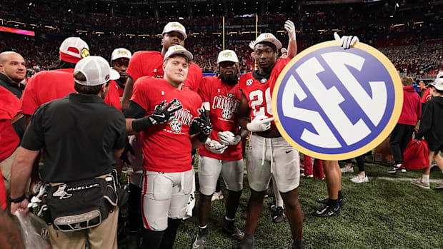 The Georgia Bulldogs react after defeating the Texas Longhorns