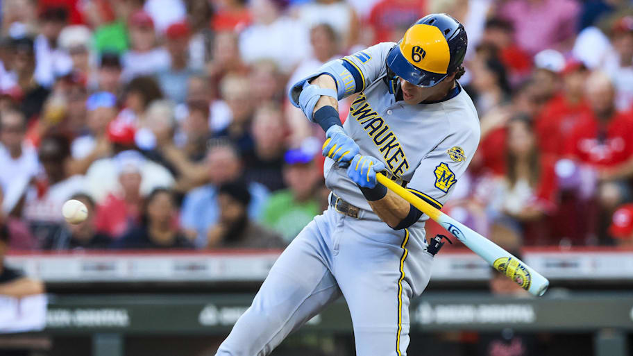 Christian Yelich hit two home runs in a comeback win over the Reds using a Bob Uecker bat.  | Katie Stratman-Imagn Images