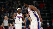 Nov 20, 2024; Memphis, Tennessee, USA; Philadelphia 76ers guard Tyrese Maxey (0) and center Joel Embiid (21) react during the second half against the Memphis Grizzlies at FedExForum. Mandatory Credit: Petre Thomas-Imagn Images