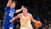 Mar 29, 2024; Detroit, MN, USA; Tennessee Volunteers guard Dalton Knecht (3) plays the ball defended by Creighton Bluejays guard Baylor Scheierman (55) in the second half during the NCAA Tournament Midwest Regional at Little Caesars Arena. Mandatory Credit: Lon Horwedel-USA TODAY Sports
