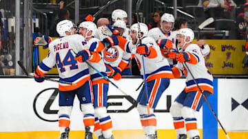 Nov 13, 2025; Las Vegas, Nevada, USA; New York Islanders center Jean-Gabriel Pageau (44) celebrates with team mates after scoring a short-handed goal against the Vegas Golden Knights during an overtime period to give the Islanders a 4-3 victory at T-Mobile Arena. Mandatory Credit: Stephen R. Sylvanie-Imagn Images