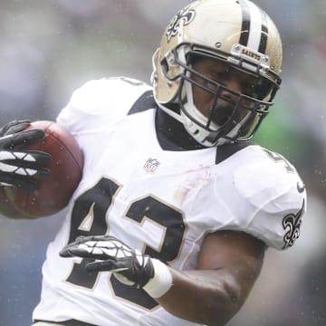 Jan 11, 2014; Seattle, WA, USA; New Orleans Saints running back Darren Sproles (43) runs the football against the Seattle Seahawks during the first half of the 2013 NFC divisional playoff football game at CenturyLink Field. Mandatory Credit: Joe Nicholson-Imagn Images
