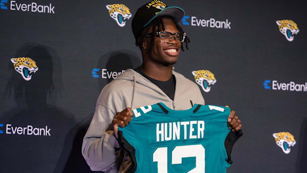 Apr 25, 2025; Jacksonville, FL, USA; Jacksonville Jaguars first round draft pick Travis Hunter poses for a photo during a pre