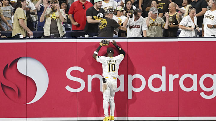 Padres left fielder Jurickson Profar watches a grand slam hit by Meadows.