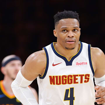 Denver Nuggets guard Russell Westbrook runs down the court after a play against the Oklahoma City Thunder