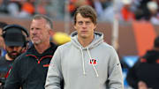 Oct 26, 2025; Cincinnati, Ohio, USA; Cincinnati Bengals quarterback Joe Burrow (9) looks on on the sidelines during the second quarter against the New York Jets at Paycor Stadium. Mandatory Credit: Joseph Maiorana-Imagn Images