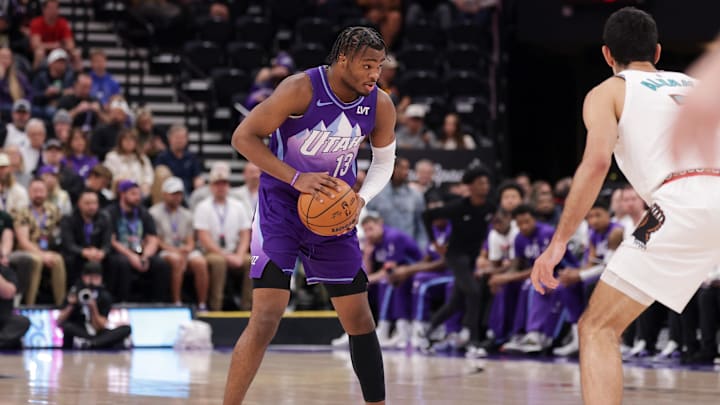 Mar 25, 2025; Salt Lake City, Utah, USA; Utah Jazz guard Isaiah Collier (13) controls the ball during the first quarter against the Memphis Grizzlies at Delta Center. Mandatory Credit: Chris Nicoll-Imagn Images